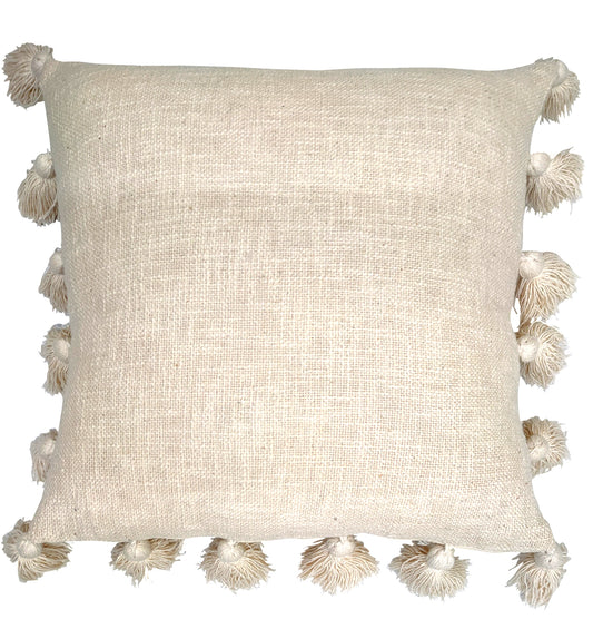 Beige cushion with tassels