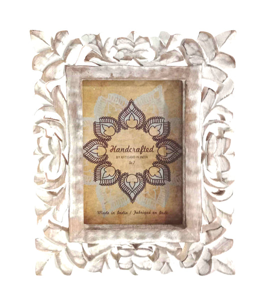 White washed carved wooden frame